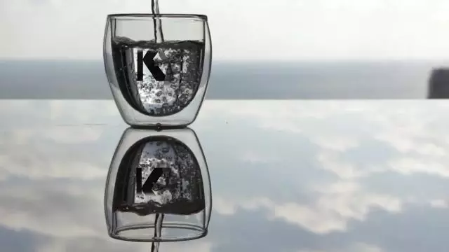 kollossus K logo in glass